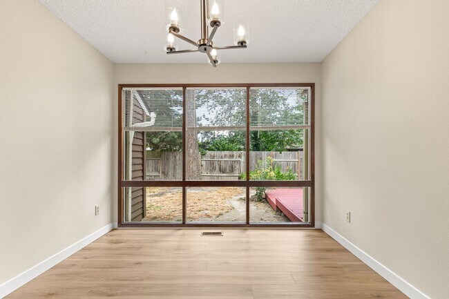 Building Photo - Must See! 3 bed/2 bath home with amazing private backyard - Double Garage/Community Pool