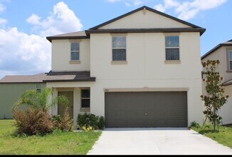 Building Photo - 4-bedroom, 3-bath home offering 1,881 square feet of comfortable living.