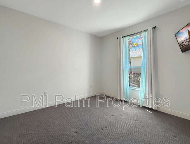 Building Photo - 9870 SW Trumpet Tree Cir