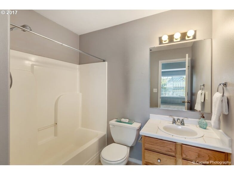 On suite bathroom with bath tub and vanity - 7414 NE Shaleen St