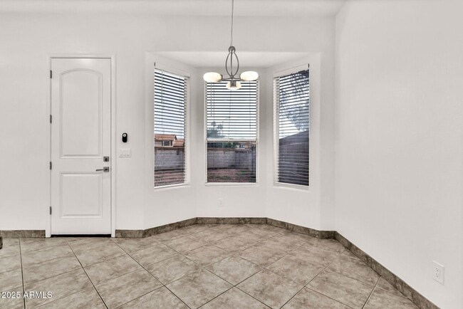 Building Photo - 9379 E Windrose Dr