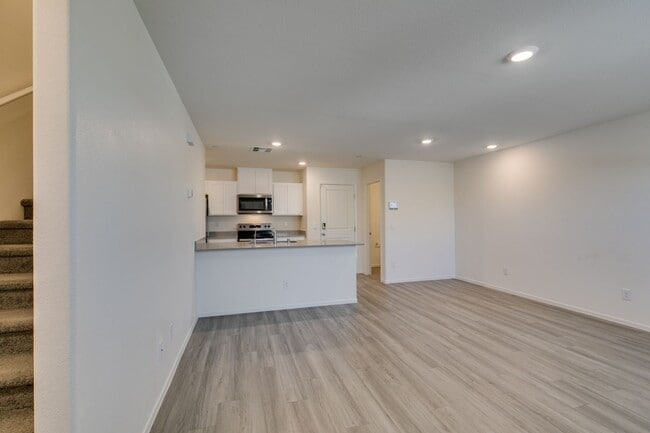 Building Photo - Gorgeous Townhome with upgrades in gated community* 3 large bedrooms, 2 car garage*Community pool...