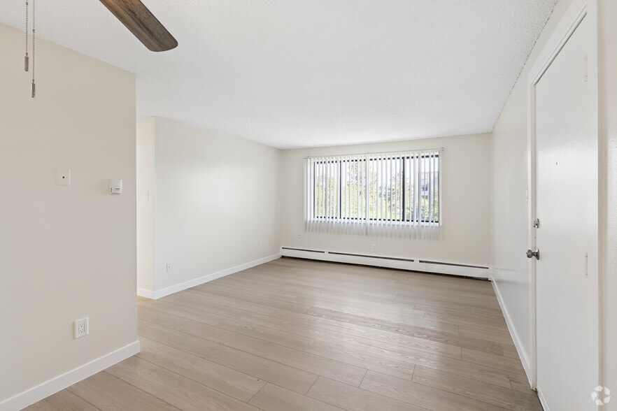2BR, 1BA - 700SF - Living Room - Orchard Glen Apartments