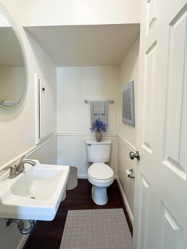 Downstairs 1/2 bathroom and understair storage. - 2802 Westhill Dr