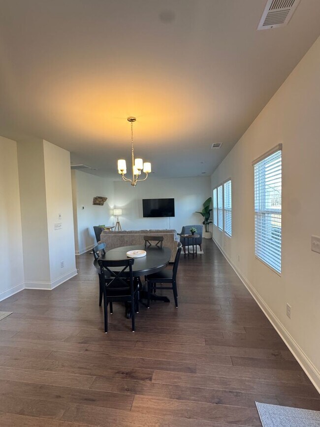 Building Photo - Fully Furnished 4BR Home with Loft, Patio & 2-Car Garage – Lawn Care Included