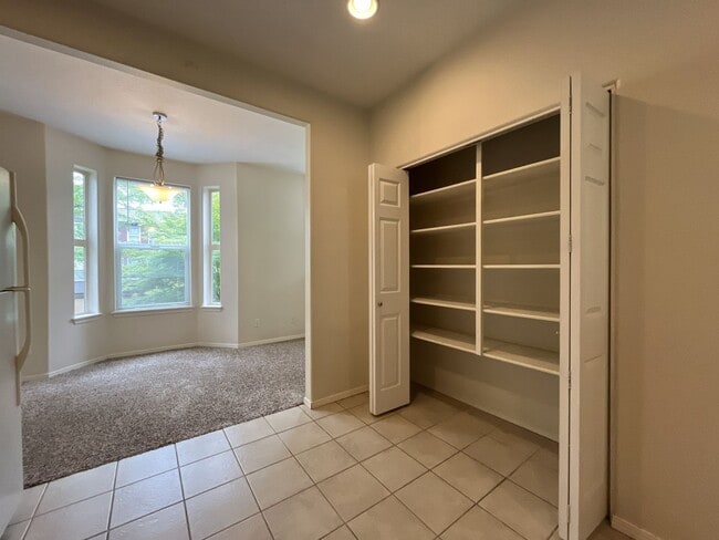 Building Photo - Spacious Three-Story Townhome Near Orenco Station with Attached Garage, Private Balcony, and Vaul...