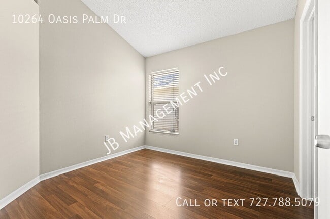 Building Photo - 10264 Oasis Palm Dr