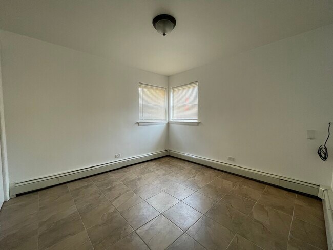 Building Photo - 7722 W Belmont Ave