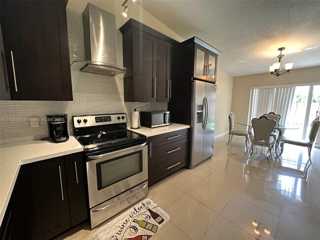 Building Photo - 6898 NW 166th Terrace