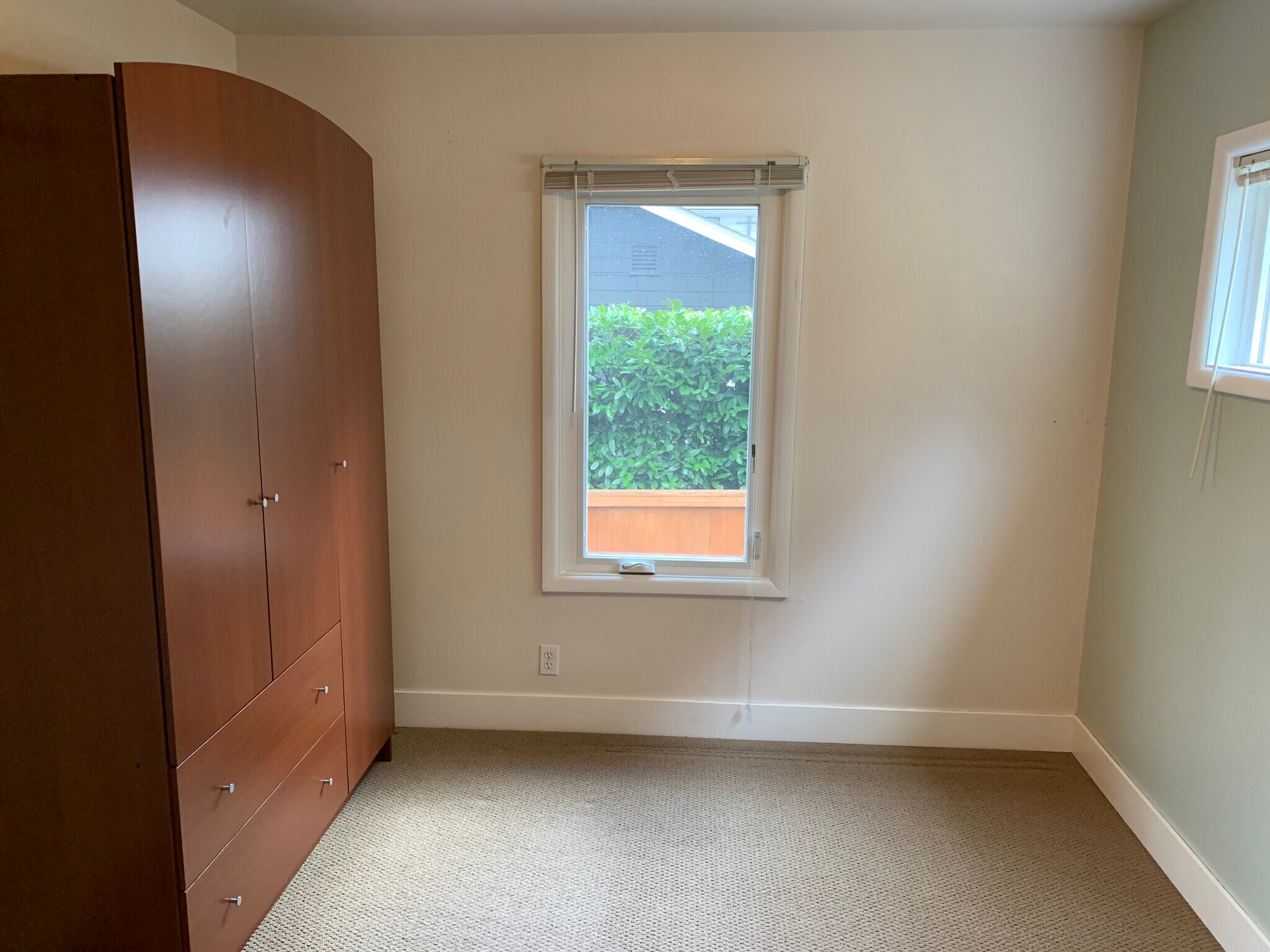 Master bedroom with optional armoire - 5211 Fauntleroy Way SW