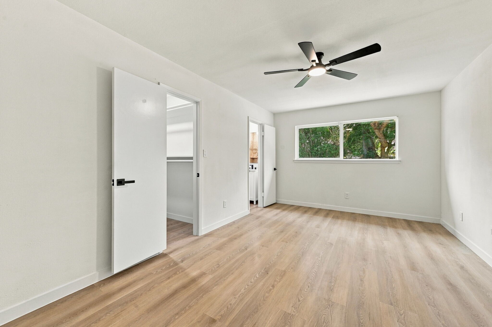 Primary bedroom w/ large walk-in closet - 8339 Carvel Ln