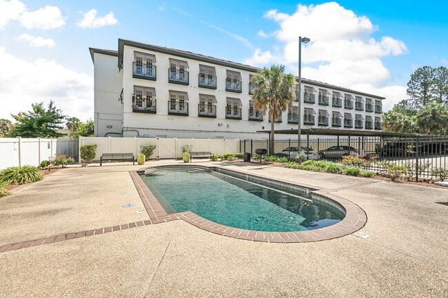 Building Photo - Perkins Palms Condominiums - 1 Bedroom Available Now