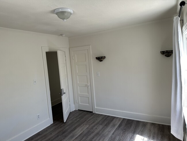 Bedroom with wall and ceiling lighting - 5027 2nd Ave