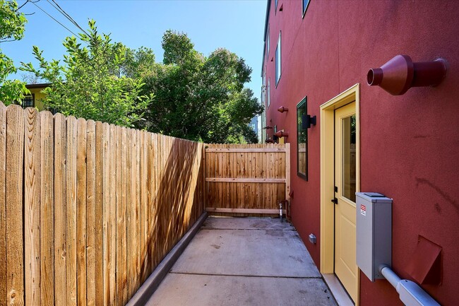 Building Photo - Modern 4-Bedroom Townhome with Rooftop Deck Near Sloan’s Lake & Light Rail