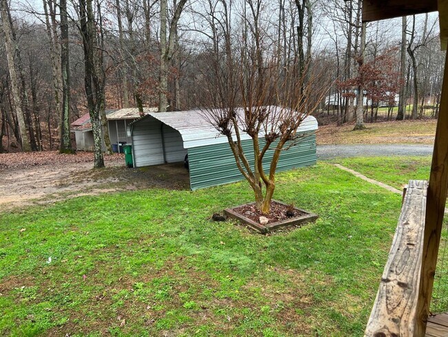 Building Photo - 2 Bed/2 Bath Home - Large Private Wooded Lot - Great Location - Large Covered Back Deck - Storage...