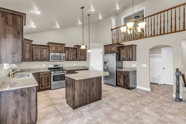 Building Photo - Spacious Syracuse Home with Covered Deck, Loft & Oversized 3-Car Garage