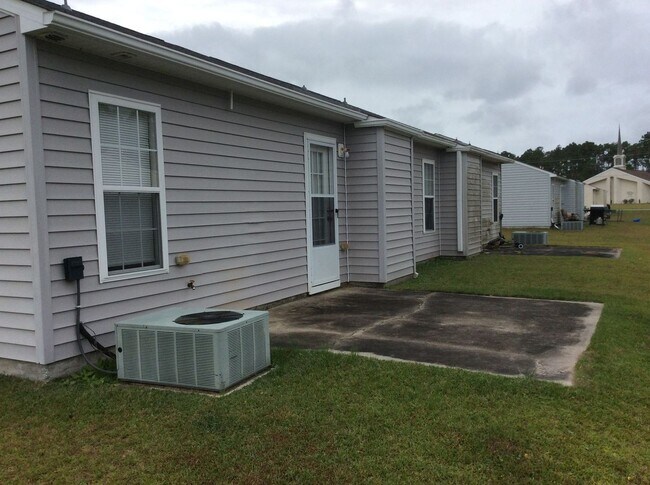 Building Photo - Charming 2-Bedroom, 2-Bath Duplex with Garage