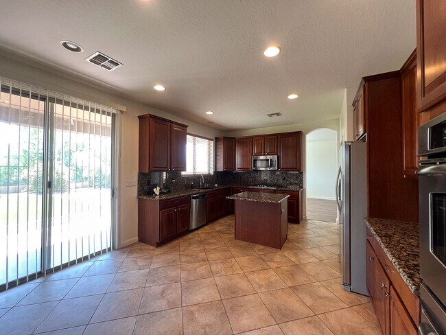 Building Photo - 4 Bed + Office | 3 Bath | 3-Car Garage | E...
