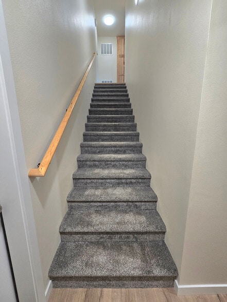 Stairs to Open-Concept Kitchen and Living Area, Bathroom and 2 Bedrooms - 1408 Edington Ave