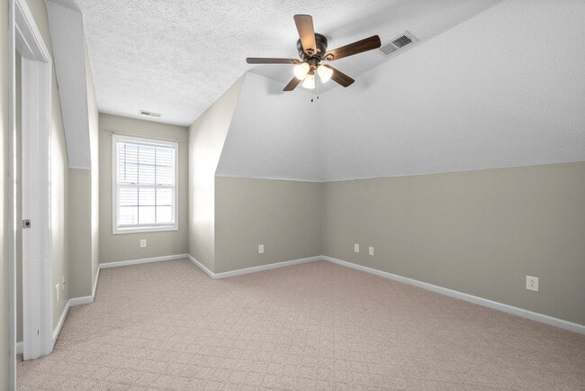 Building Photo - Pet Friendly Three Bedroom with Bonus!