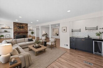 Building Photo - Completely Renovated Corner Townhome with Modern Kitchen, Designer Baths, and Private Yard