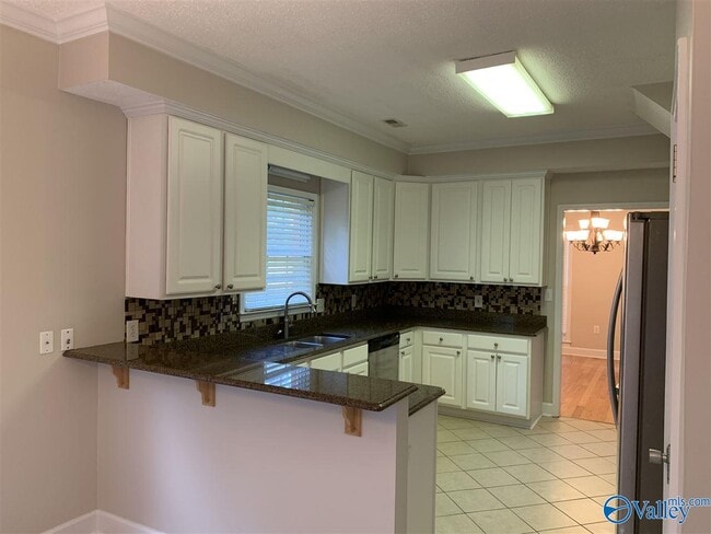 Building Photo - 129 Cannes Dr SE