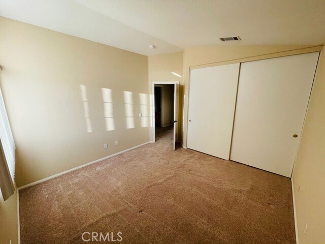 Building Photo - 42020 Dahlia Way