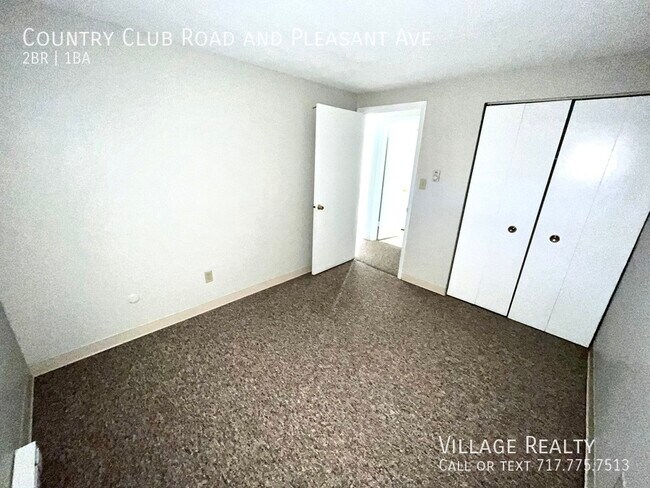 Building Photo - 605 Country Club Rd