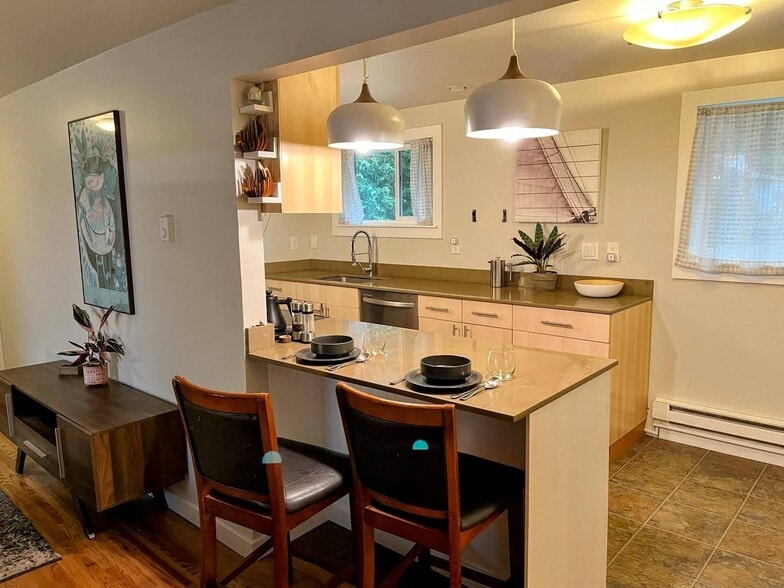 Kitchen With Bar Area For Guests - 22418 77th Ave W