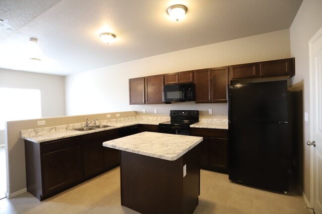 Building Photo - Contemporary, light-filled townhouse available for lease!