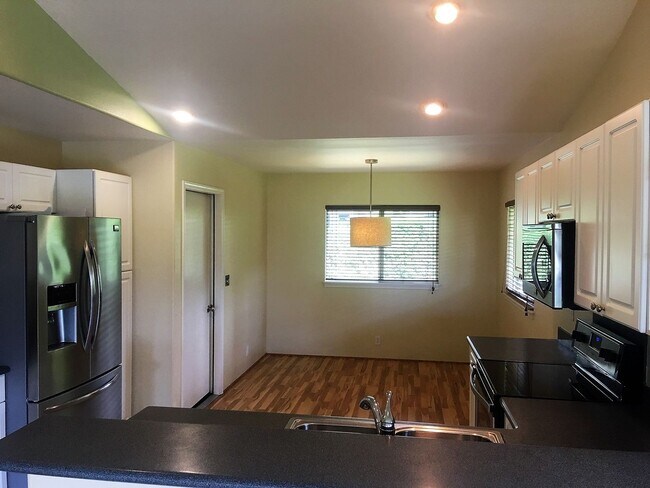 Building Photo - Available now: A 3 bedroom, 2 bath home features open concept floor plan for entertaining and a 2...