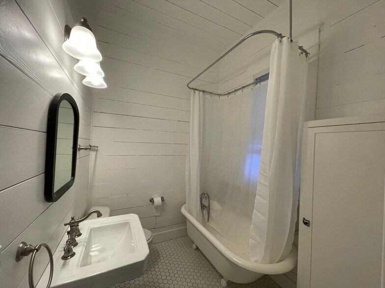 Bathroom with Clawfoot Tub - 1013 W 6th St