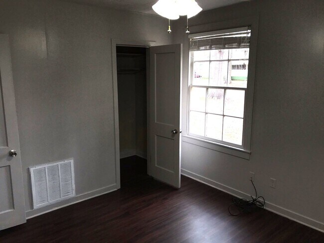 Building Photo - 3 Bedroom/1 bath home on corner lot with a large fenced back yard