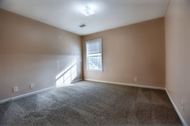 Building Photo - Pet Friendly Three Bedroom with Bonus!