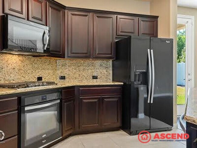 Building Photo - Stunning 4 bedroom Home In Gated Community!