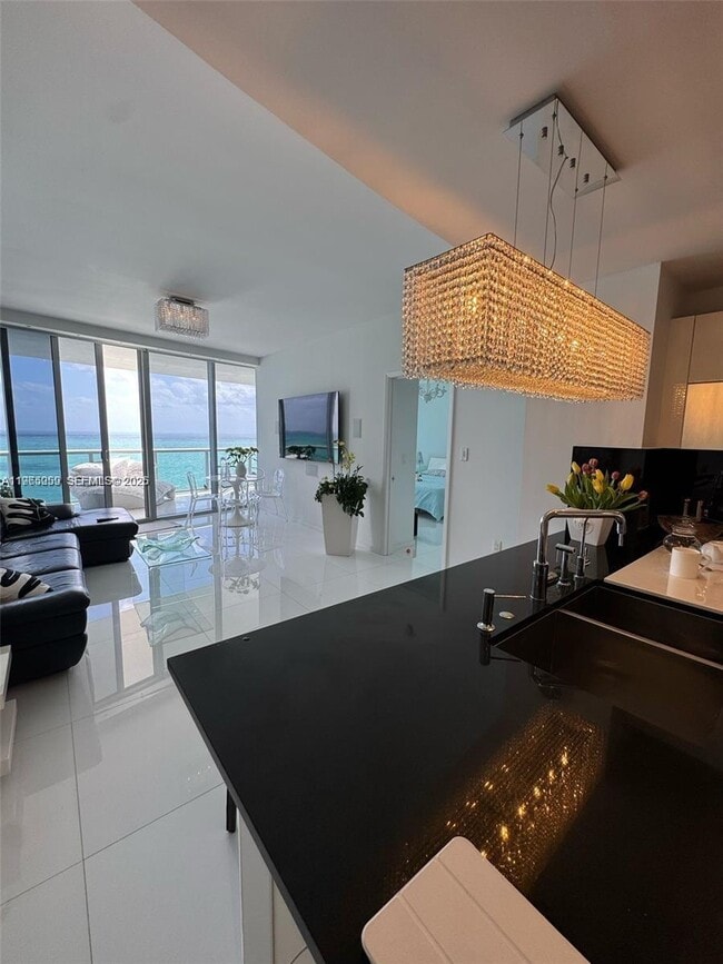 Building Photo - 17121 Collins Ave