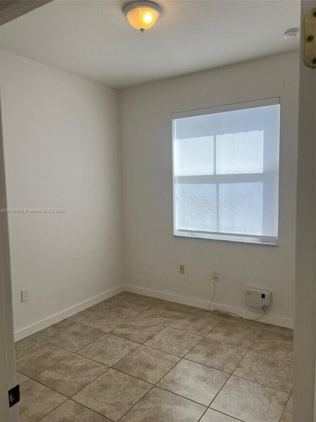 Building Photo - 23734 SW 110th Pl