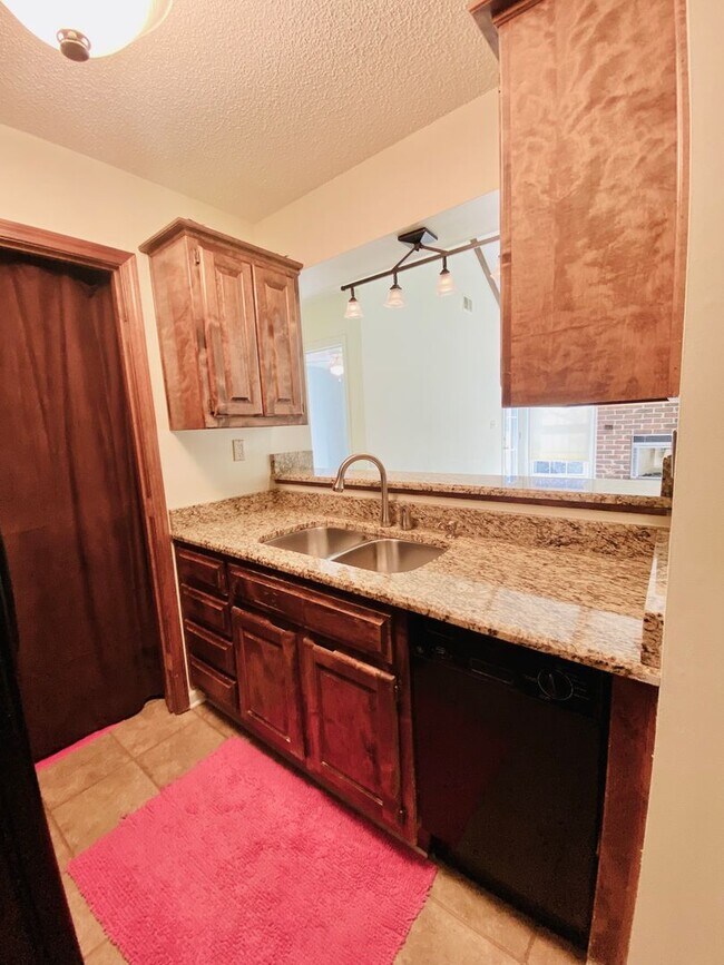 Building Photo - {12030 - F}  Updated Condo in Fantastic Location + Top Floor + Covered Parking Included + Private...