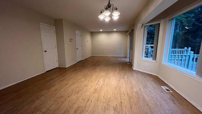 Building Photo - A spacious (4) Bedroom, (2.5) Bathroom hom...