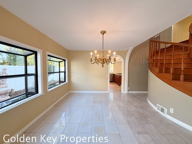 Building Photo - Welcome to this stunning 4-bedroom, 3-bathroom home located in the desirable La Costa neighborhoo...