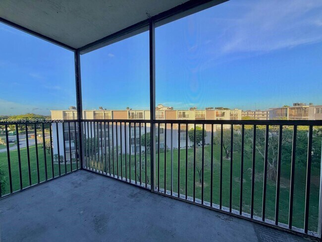 Building Photo - 8750 N Sherman Cir