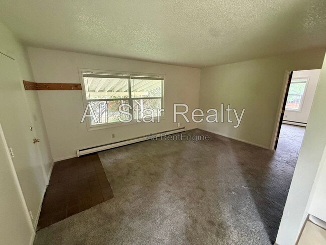 Building Photo - 5701 E 98th Ave
