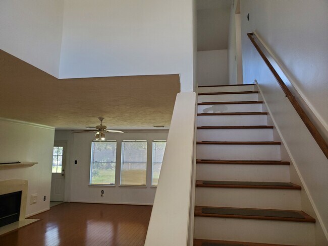 Stairs and living room - 10838 Cliffton Forge Dr