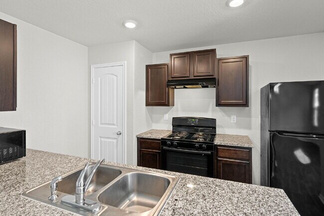 Building Photo - Welcome to Your Bright and Inviting Home
