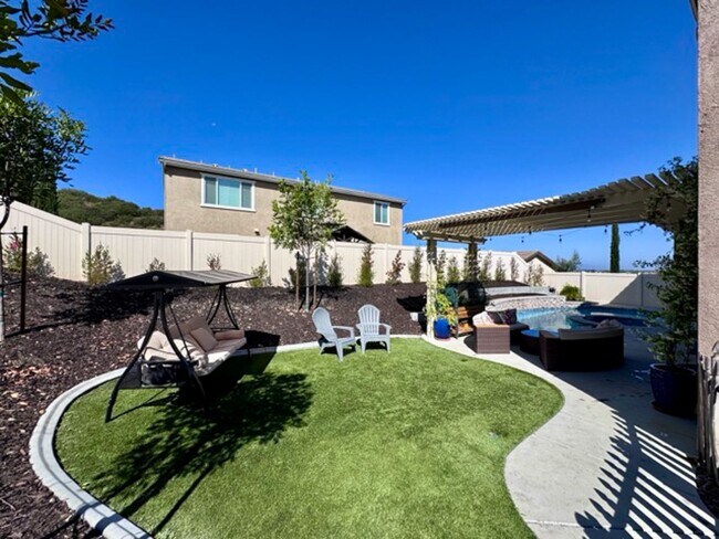 Building Photo - Stunning 5 Bedroom + Office Home with Priv...