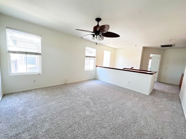 Building Photo - 4 bedroom home. New Carpet!