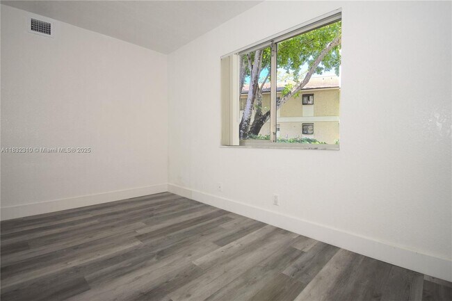 Building Photo - 301 Gardens Dr