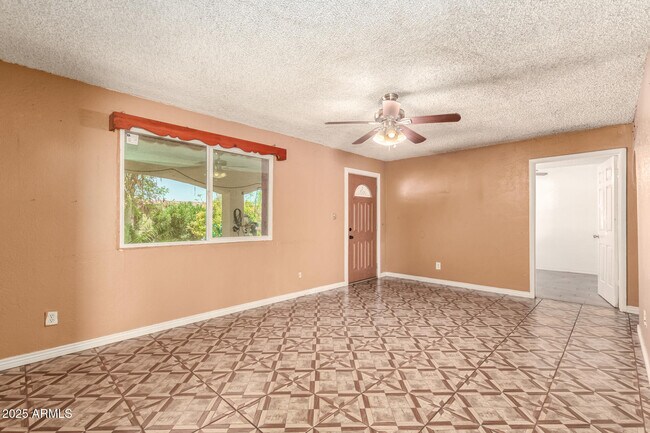 Building Photo - 3316 N 63rd Ave