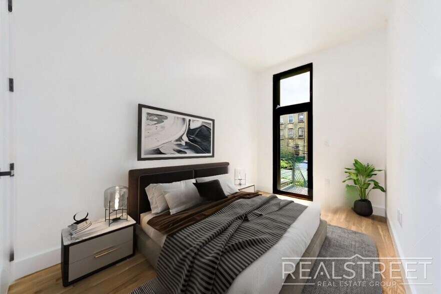 Building Photo - Stunning New 2 Bed 2 Bath with Backyard in...