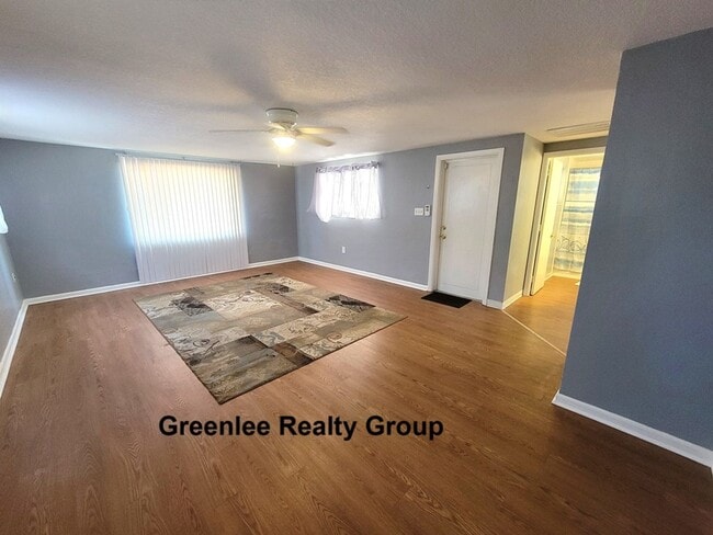 Building Photo - Cozy 2 Bed/1 Bath Duplex Apt with a Carport and Large Fenced Back Yard!